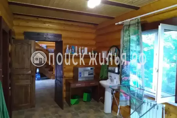 Частный сектор «Бревенчатый дом в лесу у моря»