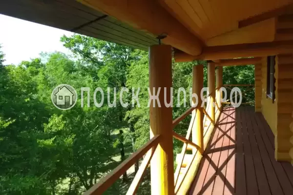 Частный сектор «Бревенчатый дом в лесу у моря»