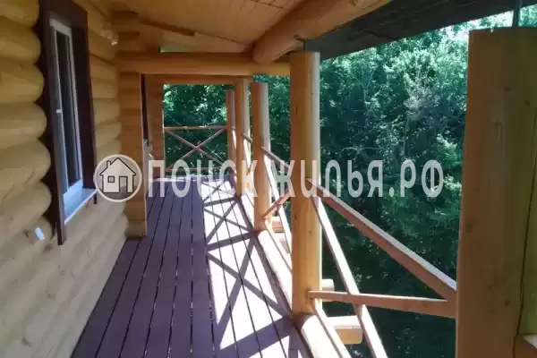 Частный сектор «Бревенчатый дом в лесу у моря»