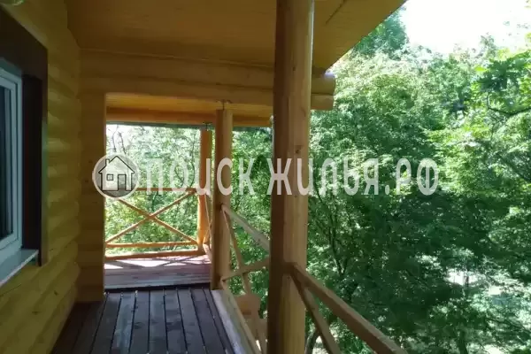 Частный сектор «Бревенчатый дом в лесу у моря»